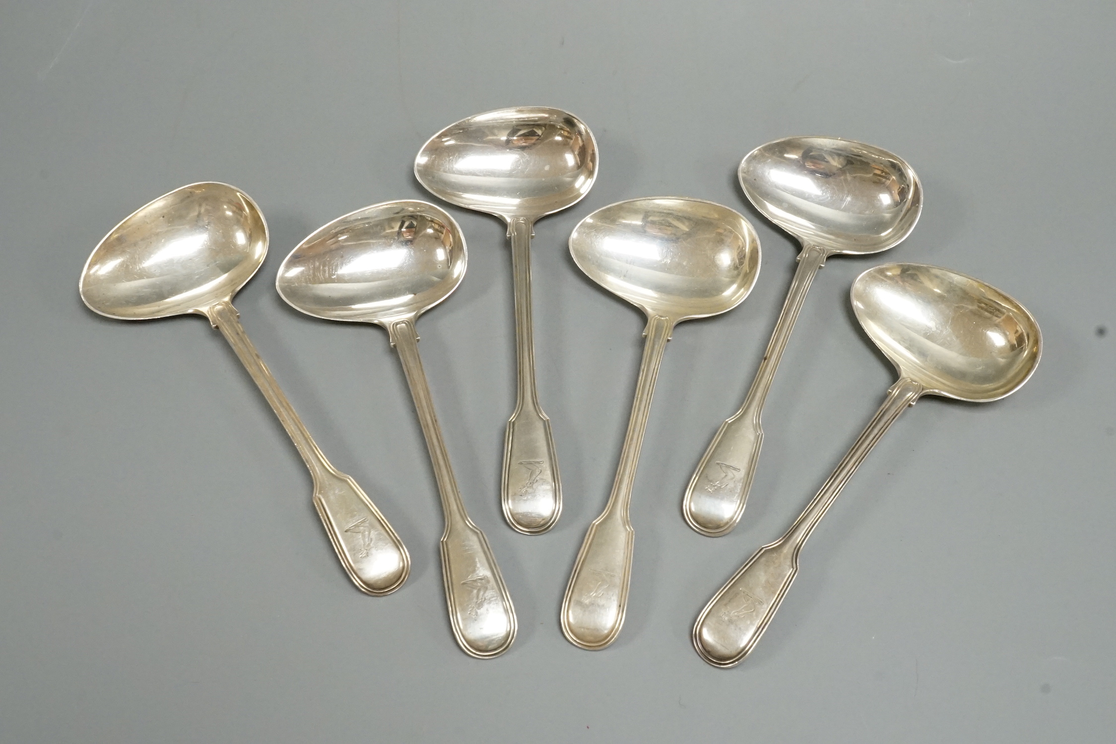A set of six Edwardian silver fiddle and thread pattern sauce ladles, Goldsmiths & Silversmiths Co Ltd, London, 1907, 13.7oz.